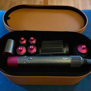 Pink/silver Dyson Airwrap complete styler with 8 attachments and case